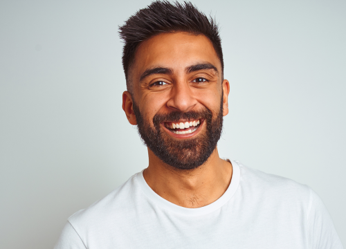 Happy man after acne treatments