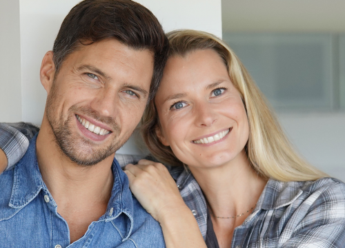 Happy couple after hair loss treatments
